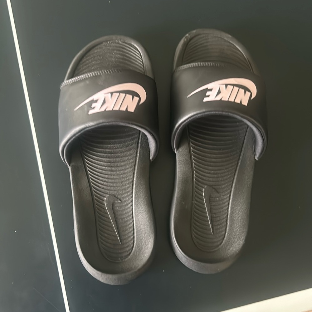 Black Nike slides